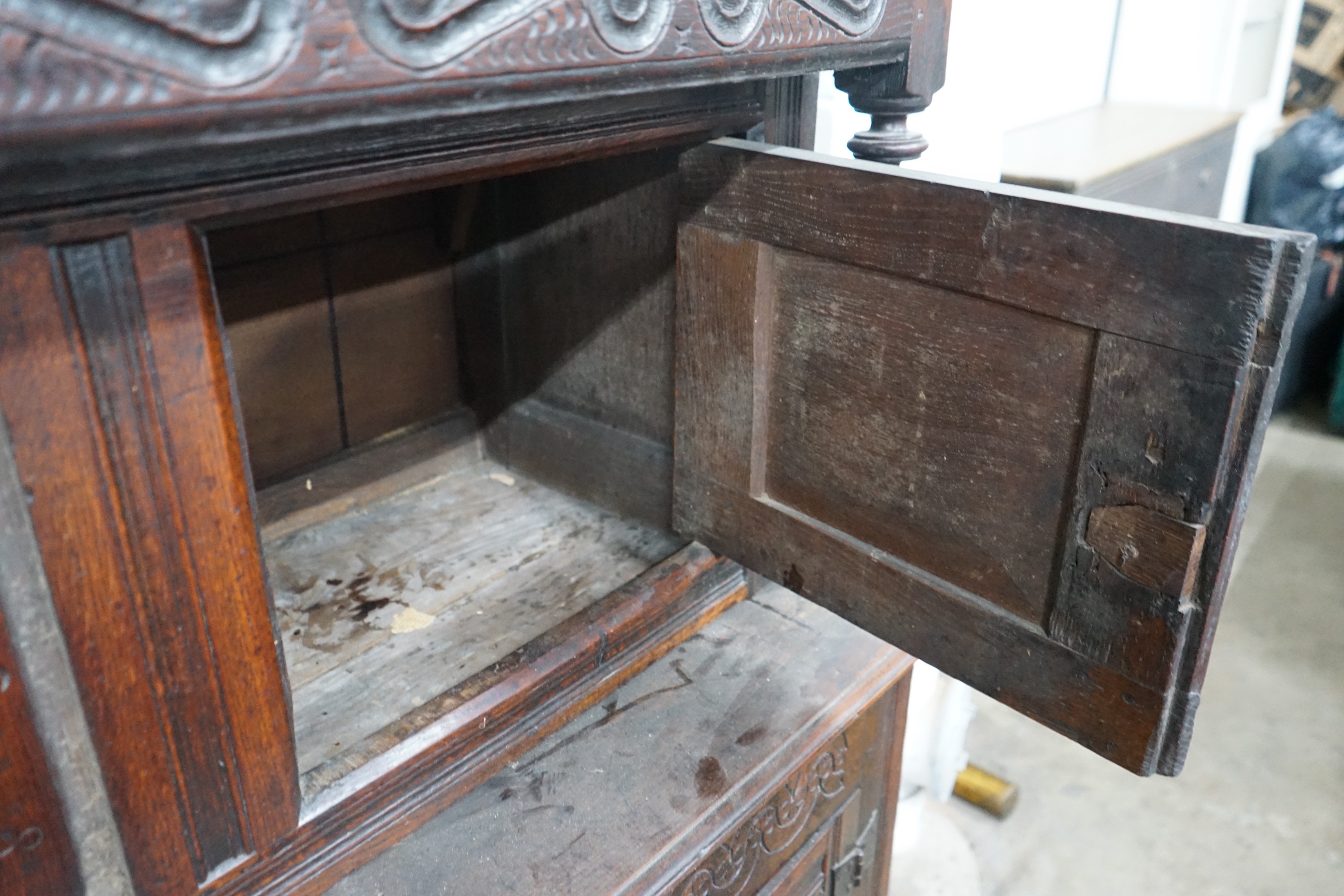 A 17th century oak court cupboard, width 139cm, depth 57cm, height 146cm